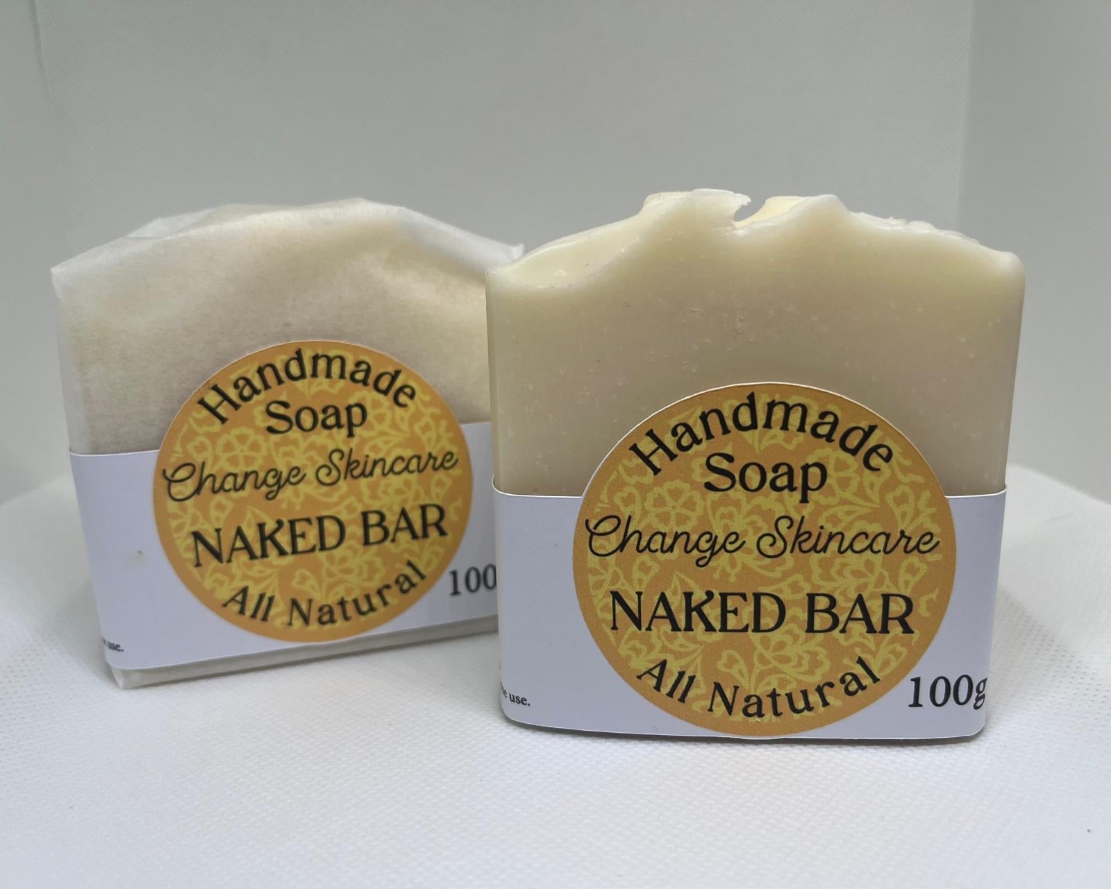 soap bar with cardboard label with the text handmade soap change skincare naked bar all natural